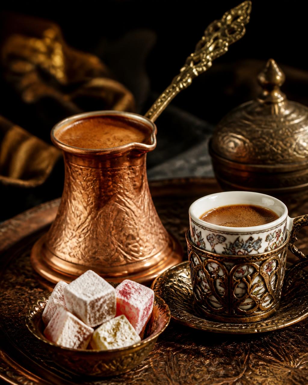 Turkish coffee served in a copper cezve